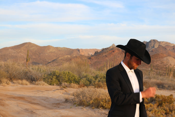 Cowboy hats at a western wedding