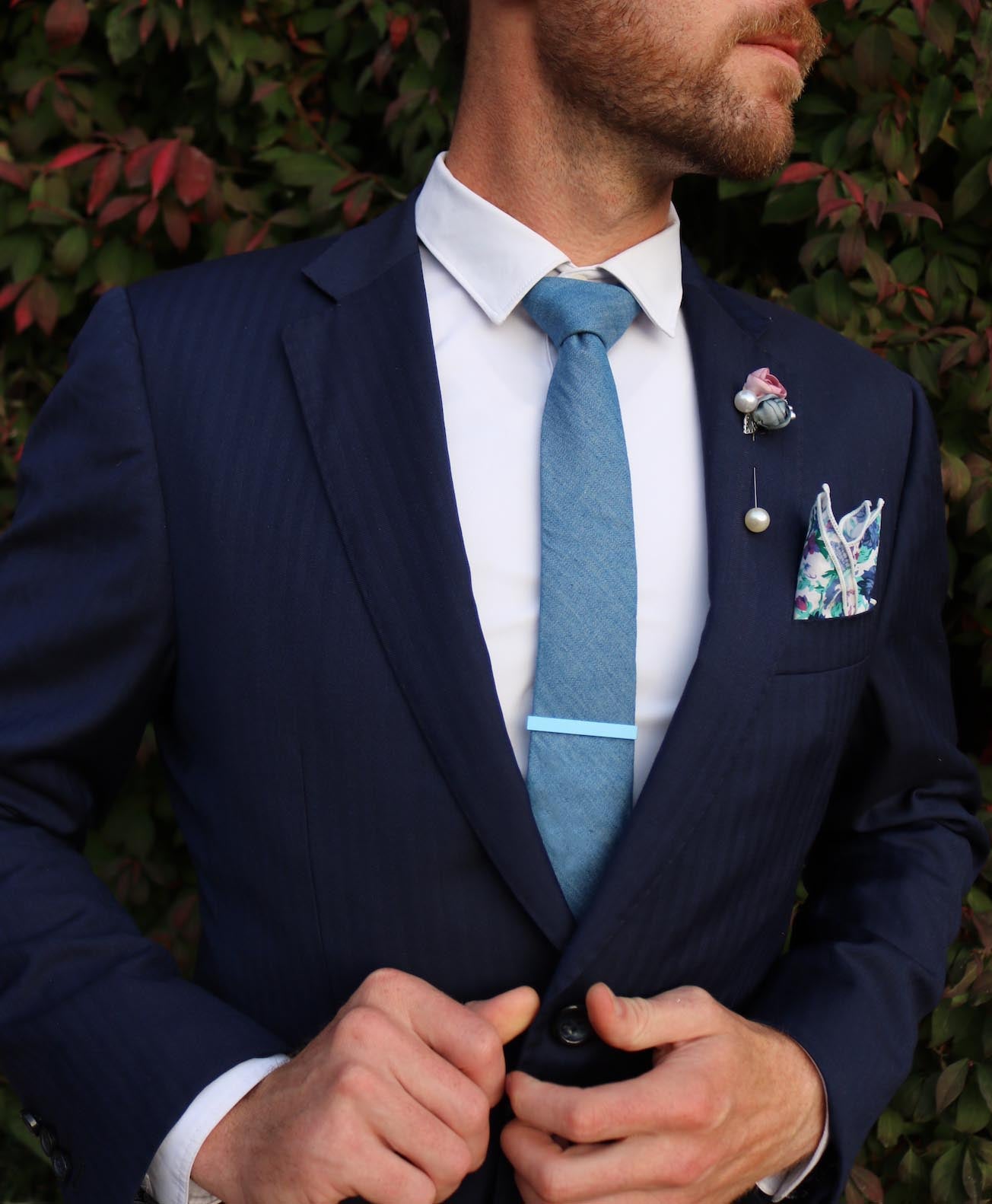 light blue suit floral tie